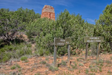The historic Puntenney Kiln in the Prescott National Forest of Arizona. The Kiln is one of the few relics left of the ghost towns of Puntenney and Cedar. The signs were put up by the National Forest Service.