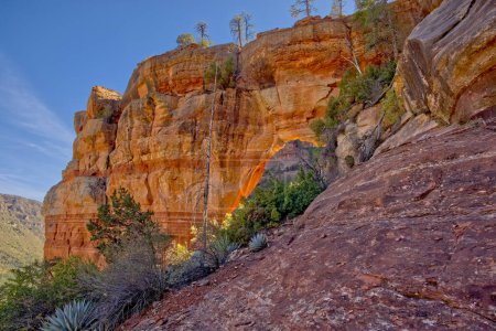 Photo for View from the north side of the Pendley Arch north of Sedona Arizona. The arch is in the Coconino National Forest just outside of Slide Rock State Park. - Royalty Free Image
