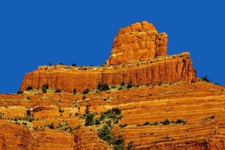 A closeup view of Sedona's famous Steamboat Rock. This view was captured from Highway 89A near the Midgley Bridge.