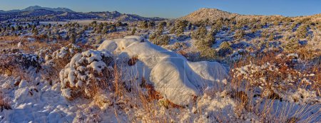 Winter View from Sullivan Butte. A winter view of Chino Valley Arizona from snow covered rocks on Sullivan Butte.