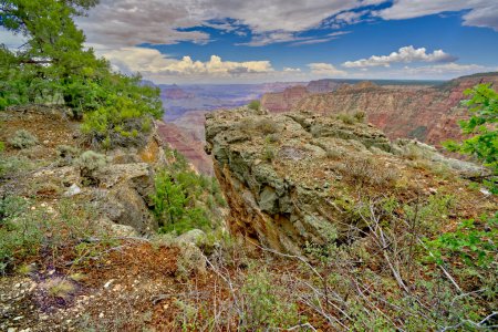 A craggy rock outcrop along the south rim of Grand Canyon Arizona east of Grandview Point during the 2022 Monsoon season.