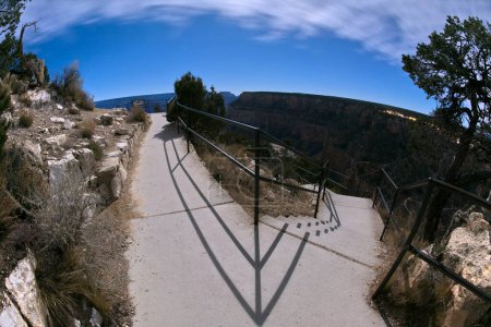Steps leading to Trailview Overlook at Grand Canyon Arizona under moonlight.