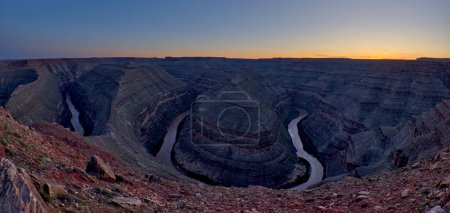 The meanders of the San Juan River viewed at sundown from the overlook in Goosenecks State Park near the town of Mexican Hat Utah.