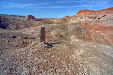 A vertical slab of stone that marks Tombstone Hill in Petrified Forest National Park Arizona.