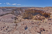 A deep fissure of eroded bentonite near Hamilili Point on the south end of Petrified Forest National Park Arizona. magic mug #711088300