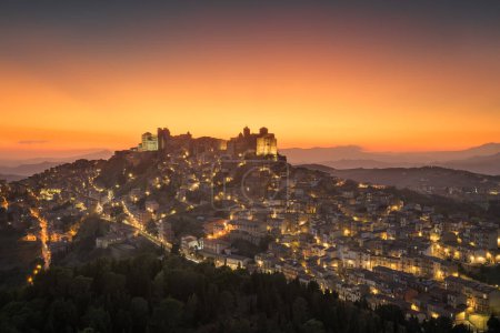 Troina, Sicily, Italy hilltop townscape at dusk.