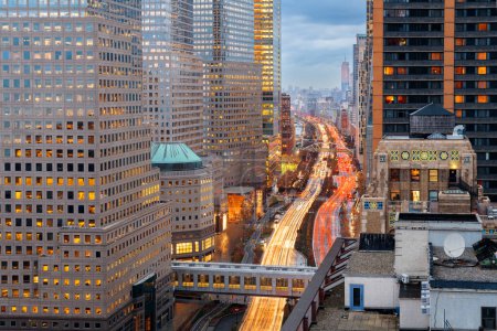 Photo for New York, New York, USA financial district cityscape over the West Side Highway at dusk. - Royalty Free Image