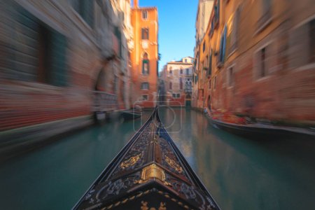 Photo for Moving down a canal on a gondola in Venice, Italy. - Royalty Free Image