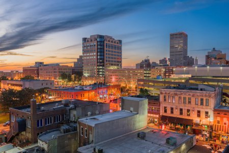 Memphis, Tennesse, USA downtown cityscape at dusk over Beale Street.