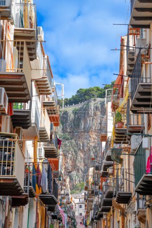 Photo for Cefalu, Sicily, Italy alleyways with views towards La Rocca. - Royalty Free Image