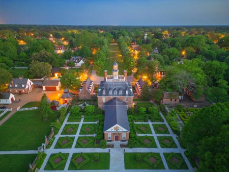 Photo for WILLIAMSBURG, VIRGINIA - MAY 8, 2023: Historic Williamsburg Village at the Governor's Palace at twilight. - Royalty Free Image