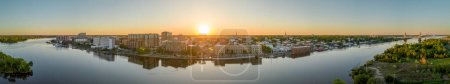 Wilmington, North Carolina, USA downtown cityscape panorama over the Cape Fear River.