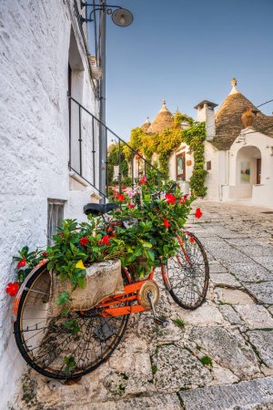 Streets of Alberobello, Italy with the historic Trullo houses.