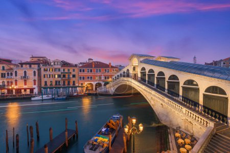 Photo for Venice, Italy at the Rialto Bridge over the Grand Canal at twilight. - Royalty Free Image