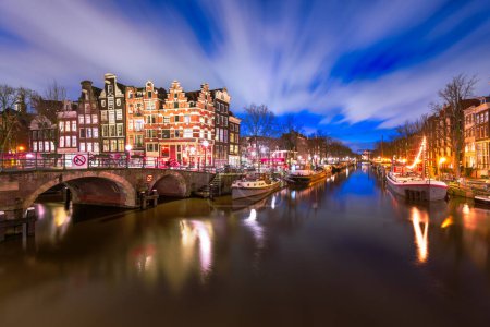 Photo for Amsterdam, Netherlands bridges and canals at twilight. - Royalty Free Image