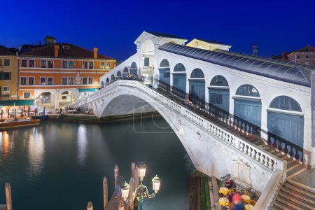 Photo for Venice, Italy at the Rialto Bridge over the Grand Canal at blue hour. - Royalty Free Image