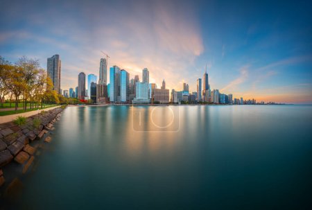 Photo for Chicago, Illinois, USA downtown skyline from Lake Michigan at dusk. - Royalty Free Image