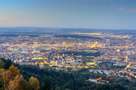 Photo for View of Zurich, Switzerland from the Top of Zurich at dusk. - Royalty Free Image