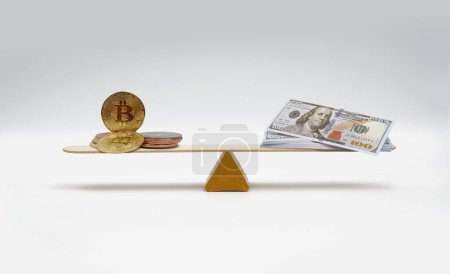 Téléchargez les photos : Équilibrage de dollar crypto sur fond blanc. - en image libre de droit