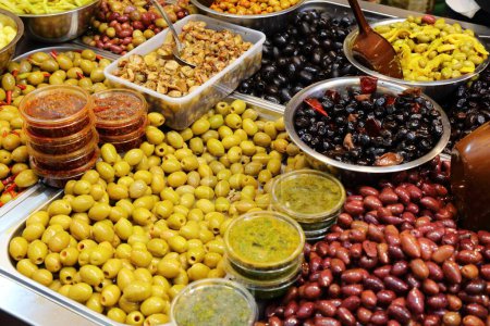 Photo for Israeli cuisine at Mahane Yehuda Market (or shuk) in Jerusalem. Various olives. - Royalty Free Image