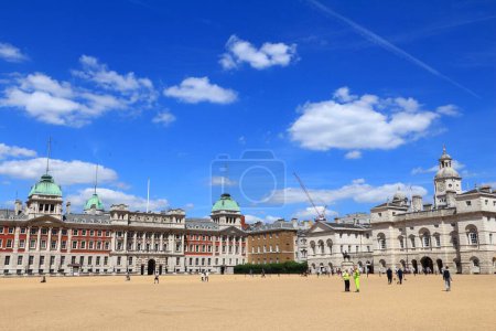 Photo for LONDON, UK - JULY 6, 2016: People visit Horse Guards Parade in London. The square is a vast, gravel-surfaced royal parade ground with a daily changing of the guard. - Royalty Free Image