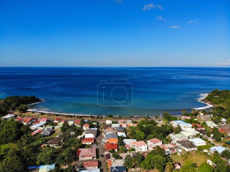 Photo for Guadeloupe drone view. Deshaies town and coast in Basse-Terre island. - Royalty Free Image