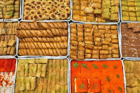 Photo for Israeli cuisine at Mahane Yehuda Market (or shuk) in Jerusalem. Baklava sweets. - Royalty Free Image