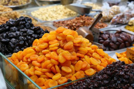 Photo for Dried apricot fruit and prunes. Israeli cuisine at Mahane Yehuda Market (or shuk) in Jerusalem. - Royalty Free Image