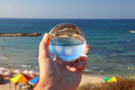 Photo for Tel Aviv city beach, Israel. Glass sphere reflection. - Royalty Free Image