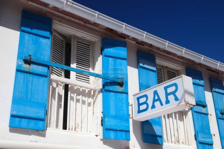 Photo for Bar sign - generic cafe bar in Guadeloupe. Creole style colors of building. - Royalty Free Image