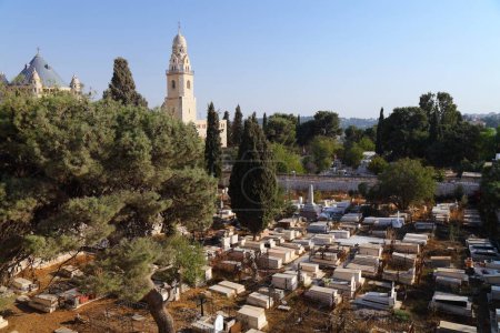 Photo for Armenian Cemetery outside the city gates of Armenian Quarter in Jerusalem, Israel. Abbey of the Dormition in background. - Royalty Free Image