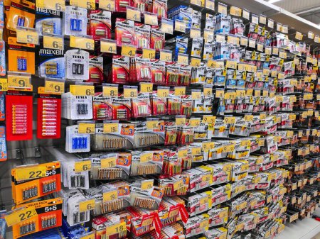 Photo for KATOWICE, POLAND - JANUARY 13, 2023: Various types of Kodak, Panasonic, Maxell and Energizer brand batteries in a supermarket in Katowice, Poland. - Royalty Free Image
