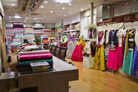 Photo for JEONJU, SOUTH KOREA - APRIL 4, 2023: Local bedding and hanbok costume shop at Nambu Market in Jeonju city, South Korea. - Royalty Free Image