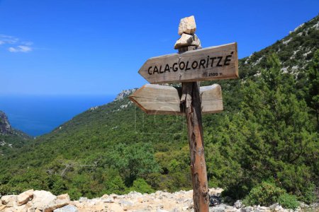 Cala Goloritze hiking trail sign in Sardinia, Italy. Baunei in Ogliastra province of Sardinia island.