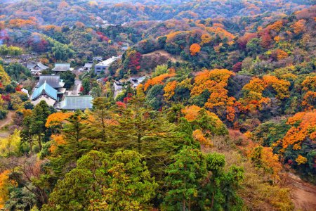 Photo for Kamakura, Japan - Zen Buddhist temple of Kencho-ji. Aerial view with fabulous autumn forests. - Royalty Free Image