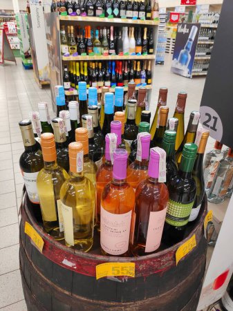 Photo for WARSAW, POLAND - OCTOBER 7, 2023: Wine choice in a supermarket in Warsaw, Poland. The front wine is made in China. - Royalty Free Image