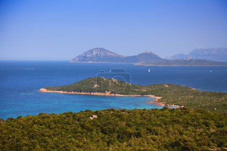 Photo for Coast landscape in Sardinia island, Italy. Capo Figari headland in background. - Royalty Free Image