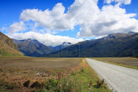Photo for Gravel road to Mount Aspiring National Park in New Zealand. South Island infrastructure. - Royalty Free Image