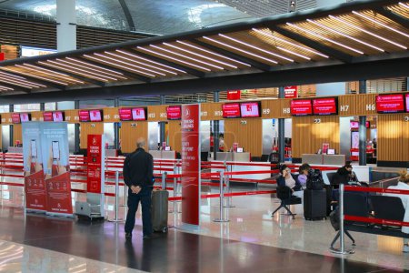 Photo for ISTANBUL, TURKEY - MARCH 25, 2023: Turkish Airlines check-in desks at Istanbul Airport, one of busiest airports in the world. - Royalty Free Image