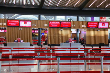 Photo for ISTANBUL, TURKEY - MARCH 25, 2023: Turkish Airlines check-in desks at Istanbul Airport, one of busiest airports in the world. - Royalty Free Image