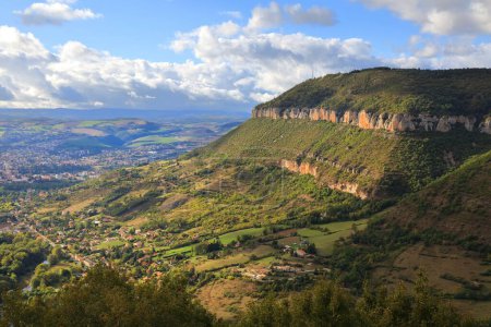 Millau town view with Causse du Larzac limestone plateau in France. One of Grands Causses, plateaus listed as UNESCO World Heritage Site.