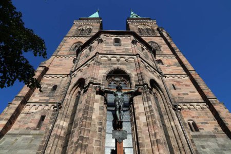 German town. Gothic architecture in Nuremberg, Germany. Medieval landmark - St. Sebaldus Church (St. Sebald, Sebalduskirche).