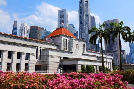 Singapore Parliament House building with city skyline in background. It is located in the Civic District of the Downtown Core.