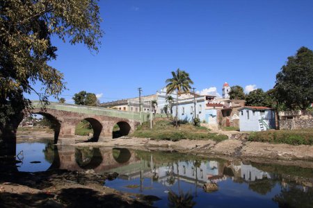 Sancti Spiritus, Cuba - townscape with River Yayabo bridge.