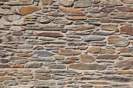 Stone wall texture. Natural rustic background. Vintage style texture.
