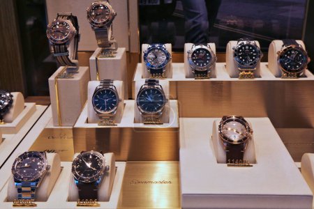 AVIGNON, FRANCE - SEPTEMBER 30, 2021: Omega brand wrist watches on display in a jewelry store in France. Omega is a luxury Swiss watch brand.