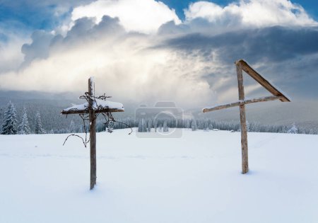 Photo for Evening winter calm mountain landscape with  wooden cross in front  (Kukol Mount, Carpathian Mountains, Ukraine) - Royalty Free Image
