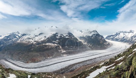 Photo for Great Aletsch Glacier and ice fall summer cloudy panorama (Bettmerhorn, Switzerland, Alps mountains) - Royalty Free Image