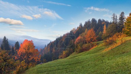 Photo for Autumn morning on mountain willage surroundings. Jaremche Town outskirts, Ivano-Frankivsk Region, Ukraine. - Royalty Free Image