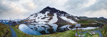 Photo for Alps mountains tranquil summer view (reflections on the lake  near Grossglockner High Alpine Road). - Royalty Free Image